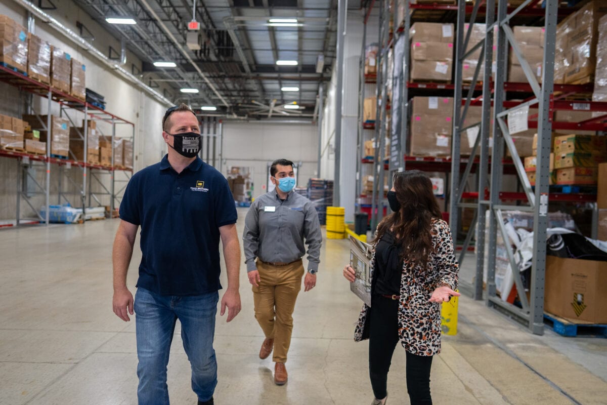 Hakes Brothers Team Touring Food Bank in San Antonio